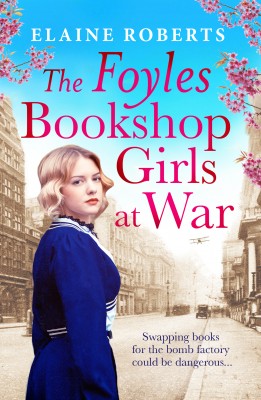 The cover of The Foyles Bookshop Girls at War. The title is written in pink and there is a young woman on the front with blonde hair and a blue period dress.