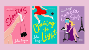 Romcom Books by author Julia Boggio, Shooters, pink cover; Chasing the LIght, blue cover; Camera Shy, Purple cover